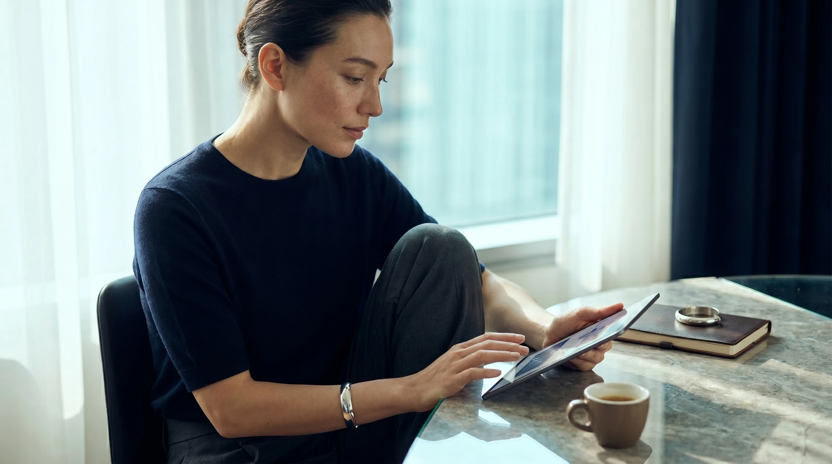 Person completing a short daily brain exercise beside a notebook